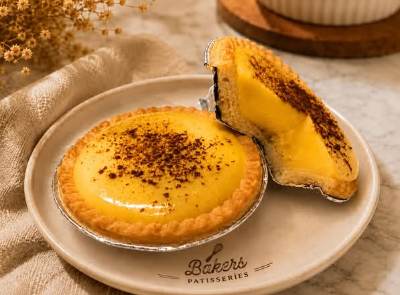A custard tart with a nutmeg top